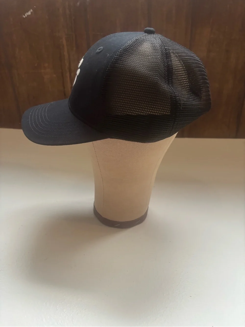 Life is Good black trucker hat daisy embroidery with a blue heart